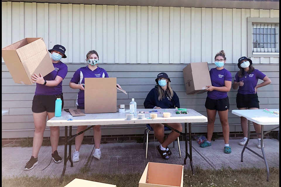 Innisfil Camp Counsellors prepare to pack Camp In A Box experiences for kids ages 6-13. SUBMITTED