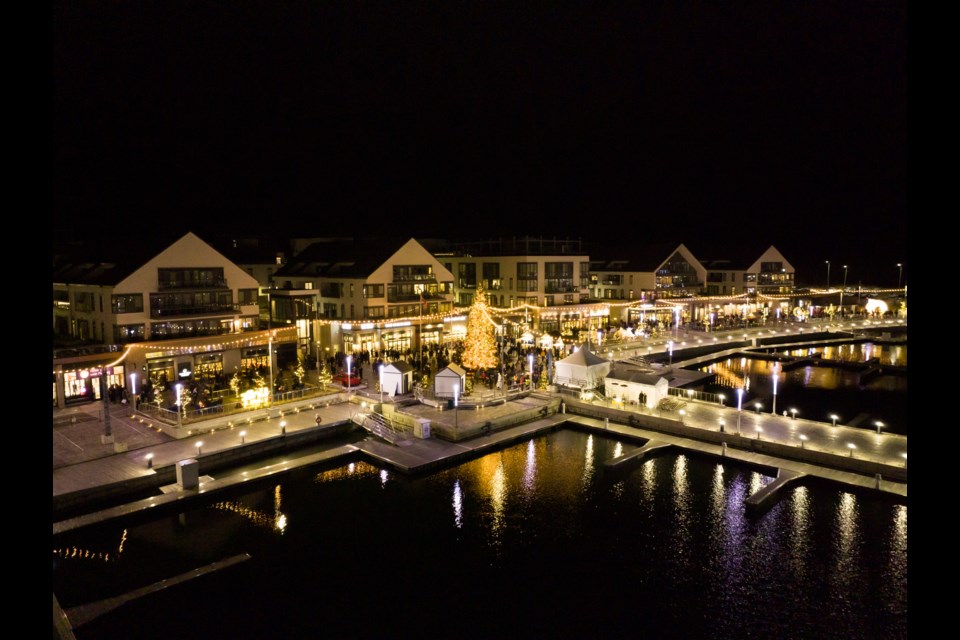 A view of the boardwalk lit up at night 