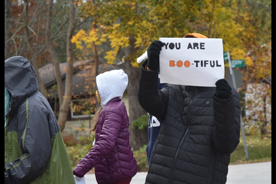 Positive message, carried in Goodfellow Public School's Mental Health Walk. Miriam King for Innisfil Today