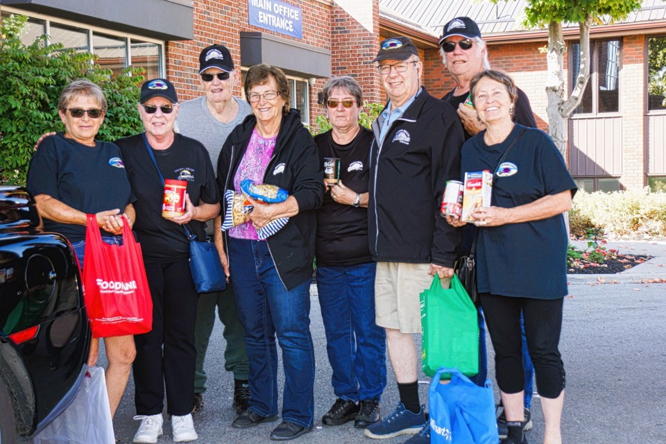 Members of the Innisfil Beach Cruisers recently donated food and money to the Innisfil Food Bank.