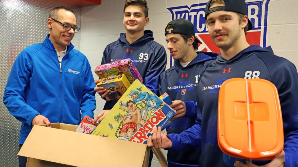 Rangers get an early jump on Friday's toy drive ...