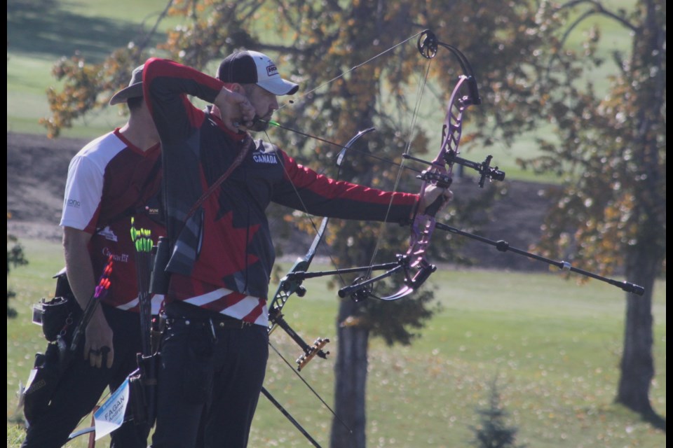 Andrew Fagan, a member of the men's team who defeated Sweden on Saturday, focuses before shooting during the match. Chris McGarry photo. 