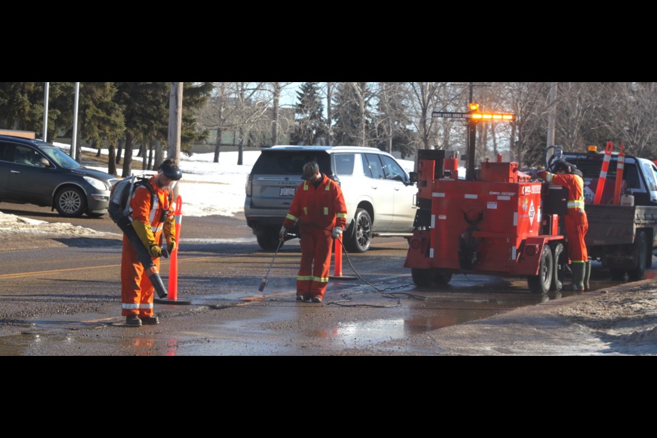 Lac La Biche County crews working on Beaver Hill road on the morning of Feb. 25. Chris McGarry photo. 