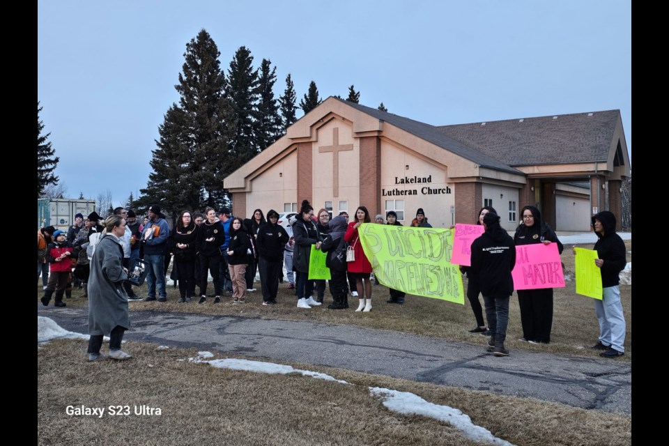 On March 7, more than 50 Participants walked 2 km from the Energy Centre to the Lutheran Church on the Millennium Trail, carrying banners and wearing “Light the Darkness” hoodies. 