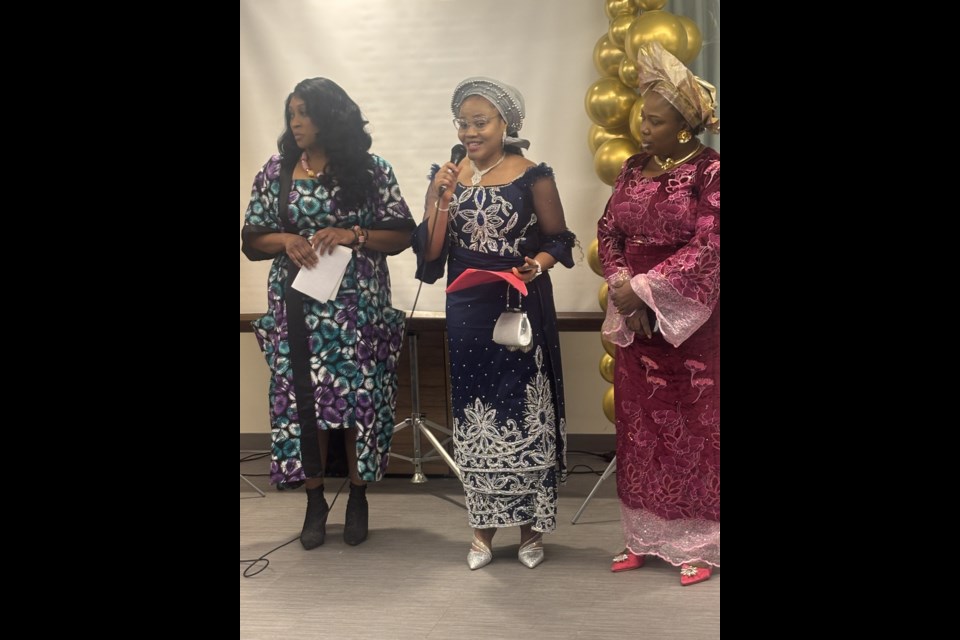 Sandra Ubabukoh, President of the Cold Lake Black Community (middle) introduced herself and educated guest about the event and the communty.