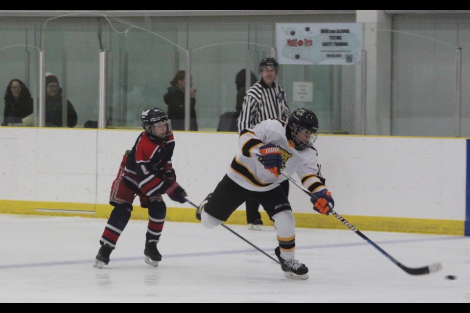 Lac La Biche Clippers U15 centre Brayden Pelkey tails Marwayne-Vermilion Tigers player Carter Rainey as he shoots during the contest between the two teams that took place at the Bold Centre on Lac La Biche on Friday, Jan. 3. The Clippers won 5-3. Chris McGarry. 