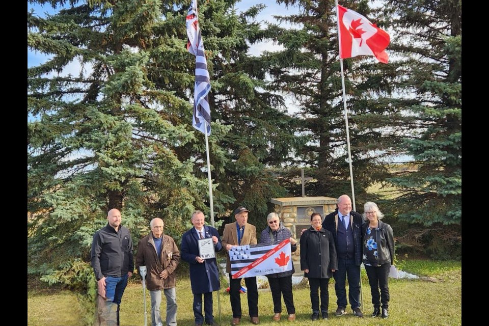 Delegates from the French region of Brittany and local residents of Breton heritage at the flag-raising ceremony, which took place at the Gourin historical site at the juncture of Highway 55 and Range Road 171 between Atmore and Plamondon. 
In photo, from left to right; 
Edmond Le Rouzic, Marcel Carmard, Pierre-Marie Quesseveur, François Ulliac from Atmore (the youngest son of Joseph and Marie-Louise Ulliac, the first Bretons to emigrate in Plamonton) Marie-Noelle Ulliac, Valérie Quesseveur, Jean-François Baudet, Anita Saint-Georges (from the local Ulliac family) Photo supplied. 


Photo supplied. 