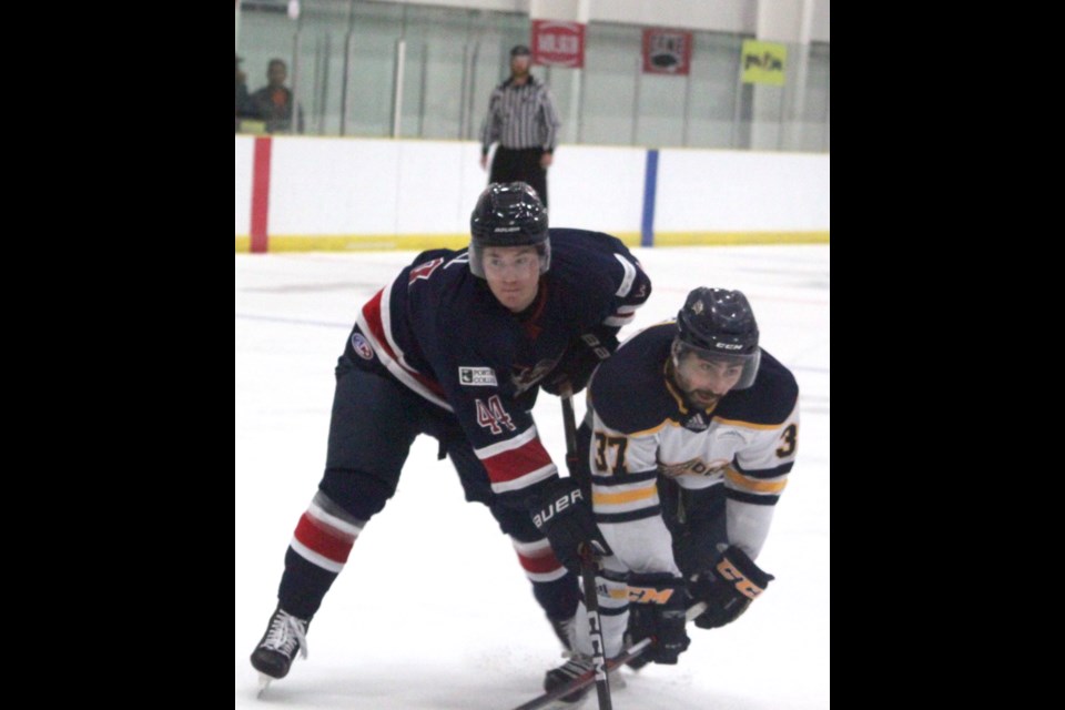 Voyageurs defenseman Bryden Bell clashes and Carson Kurylo of the Concordia University of Edmonton Thunder during the Portage College Voyageurs home opener at the Bold Center on Friday, Oct. 19. Portage College won the contest 4-3. Chris McGarry photo.