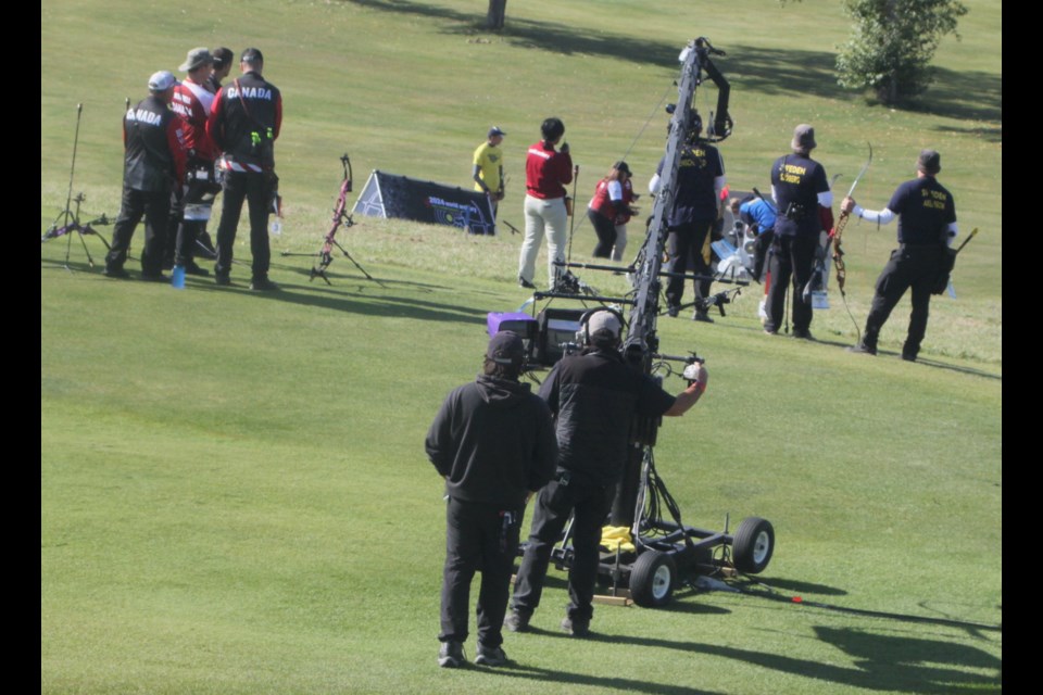 A TV crew films as Canada prepares to take on Sweden in the bronze medal match. Chris McGarry photo. 