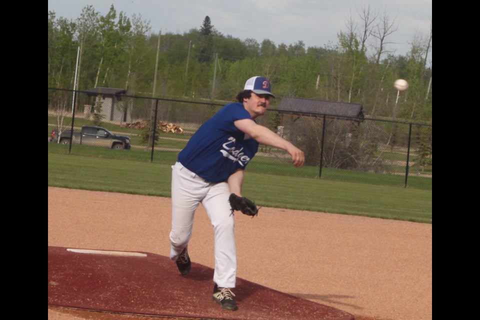 Lac La Biche Dodgers U11 player Dylan McDonald throws a ball for his team during the first inning of Tuesday’s matchup against the visiting Elk Point Sox. Chris McGarry photo. 