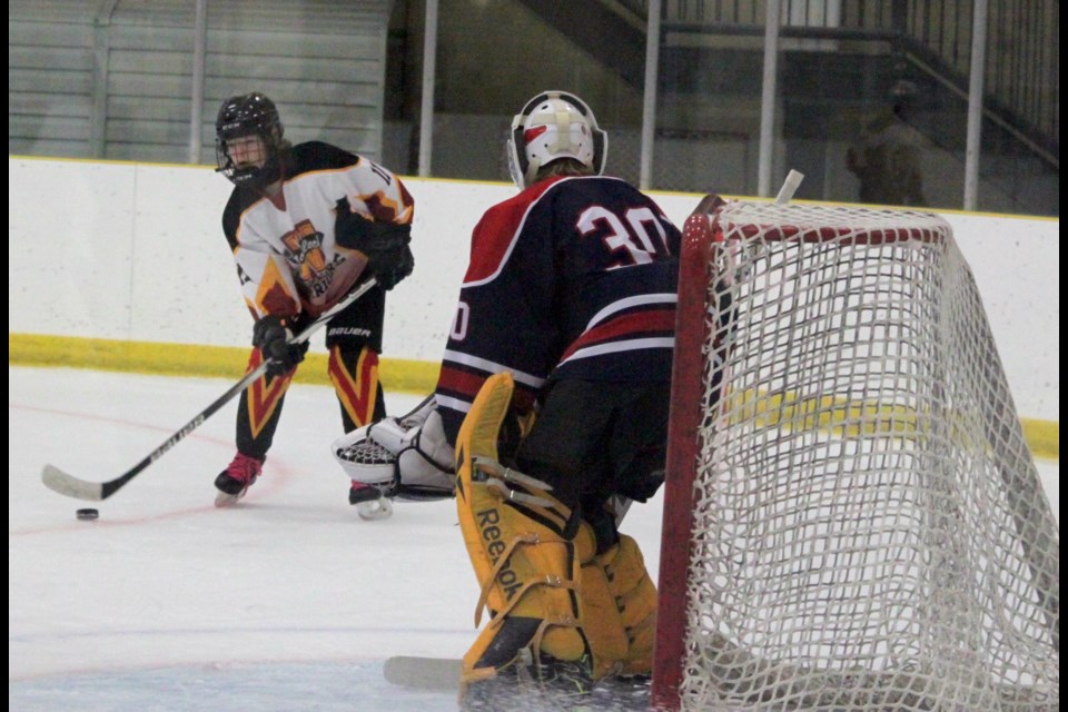 Lac La Biche Lakers goaltender Gage Collie gets ready to stop an attack on his net during Friday’s home game against the Vulcan Rampage which Lac La Biche won 7-3. Chris McGarry photo.