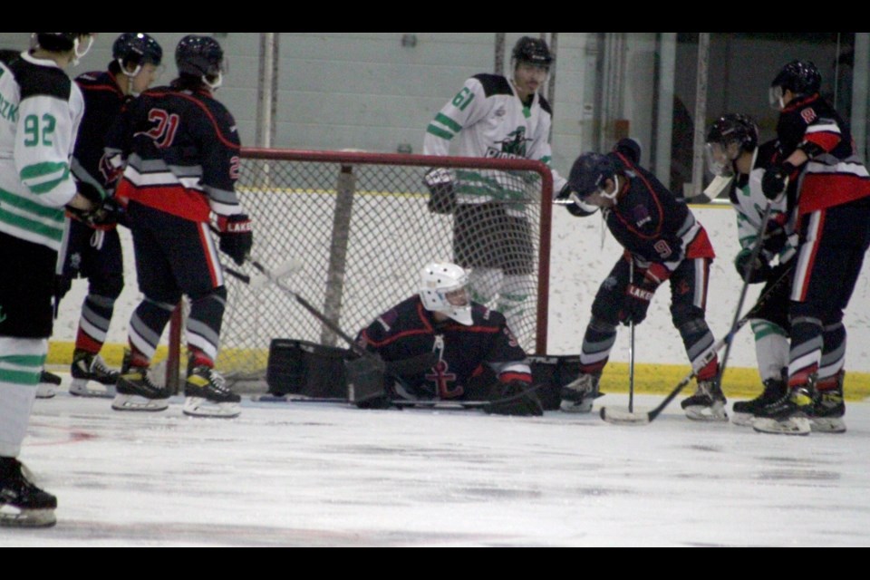 Lac La Biche Lakers goalie quickly gets into defensive mode as things heat up in the Lakers’ zone. Chris McGarry photo. 