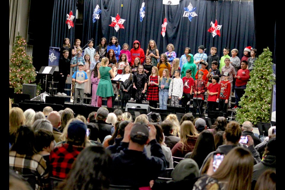 The audience watches as students from the Grade 5 class sing ‘I Want a Hippopotamus for Christmas.’ Chris McGarry photo. 