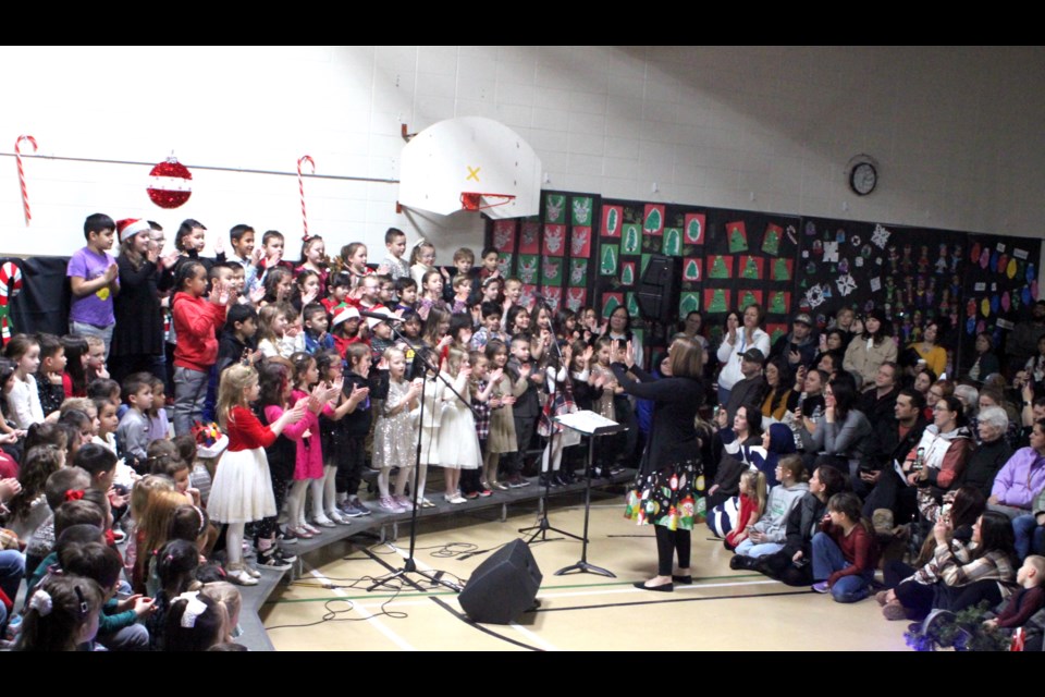 Grade one students from Vera M. Welsh Elementary School in Lac La Biche sing 'If You Can't Wait for Christmas' during the school's annual Christmas concert, which was held on Monday, Dec. 16. Chris McGarry photo. 