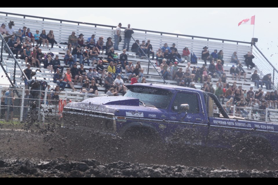 High Maintenance, driven by Kyle Bruce, roars through the mud track to the delight of the crowd that had shown up for the 2024 Plamondon Mud Bogs, which took place over the July 12 weekend. Chris McGarry photo. 