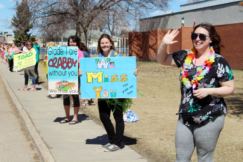 The front of Notre Dame Elementary School in Bonnyville was busy when staff and teachers held their Spring Fling parade on Tuesday, April 28.
(left to right) Irene Tremblay, Jaclyne Pain, and Nicole Brusdeilins. Photo by Robynne Henry. 