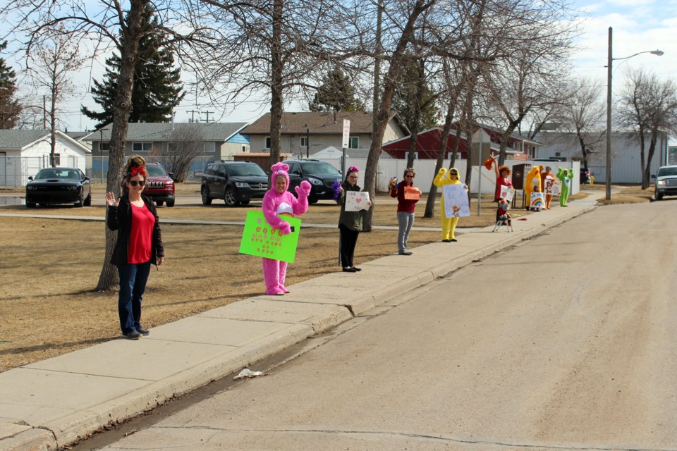 Teachers and staff at Duclos School were eager to see students during their Crazy Hair Day Parade on Friday, April 24. Photo by Robynne Henry. 