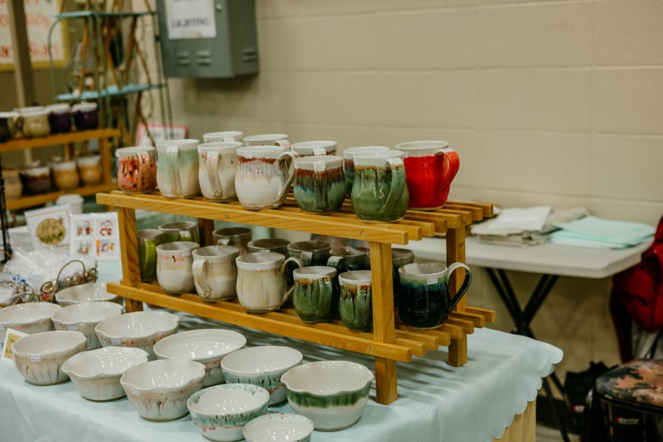 Handmade pottery and mugs were popular at the craft sale.