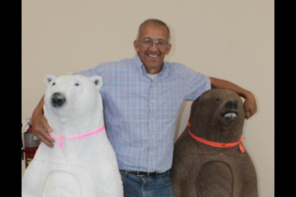 Lakeland Archers' Rene Schaub with two large bear targets. Smaller-sized targets were stolen, then returned last week from the Lac La Biche shooting field.   