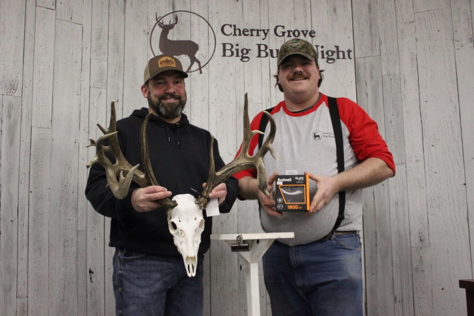 Andre Charron (right) and archery category winner Ryan Howrish are pictured.