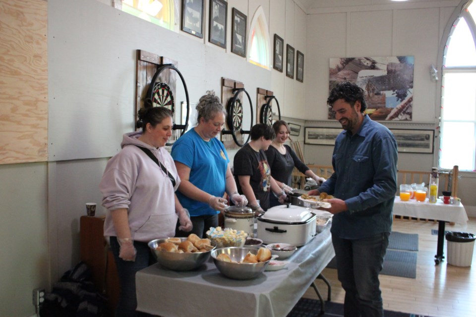 Karlin Besner gets his Turkey dinner at the Legion, served by Krista Anstruther, Stephanie Atkinson, McKenna Ladd, and Eden Zuk. The servers were volunteers from the Navy Leauge of Canada Cold Lake branch who support the Royal Canadian Sea Cadet Corps Huron.