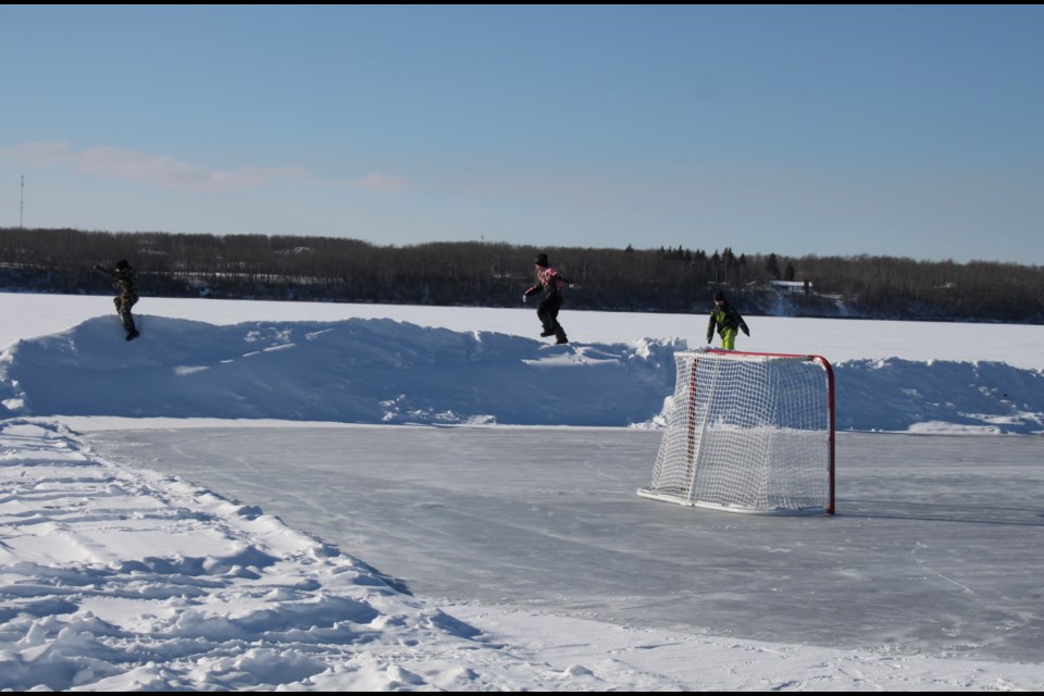 The snowbank surrounding the skating rink proved to be an unintentional feature during the Bonnyville Oilmen's Society's Family Day event.