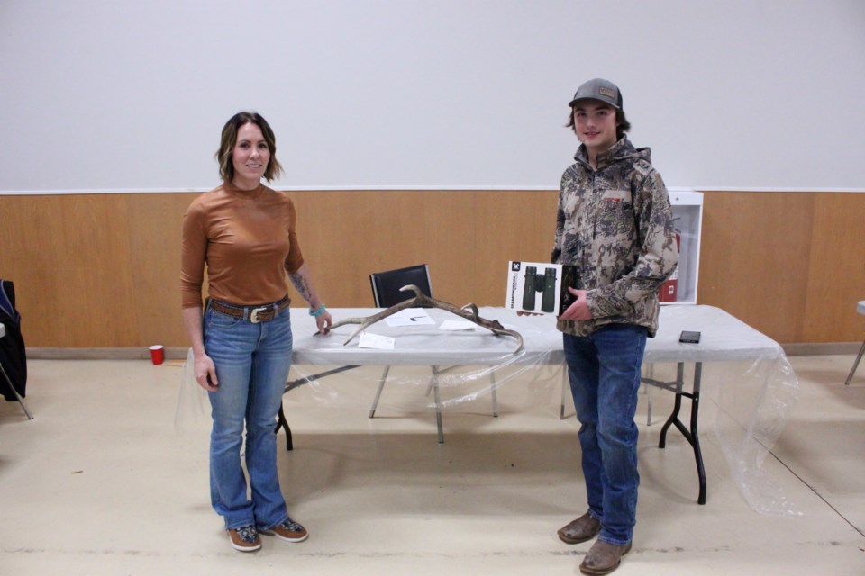 Hunting Chair Nathalie Thomson and shed winner Bret Babb at the Buck Fever Night in Bonnyville.