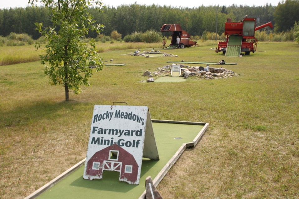 Rocky Meadows Country Getaway showcased their mini golf course made with old farm equipment.