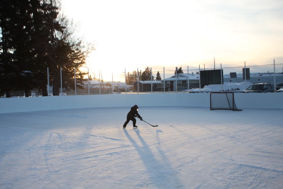 Zayne Eddamni carves up the ice at the Fort Kent outdoor skating rink.