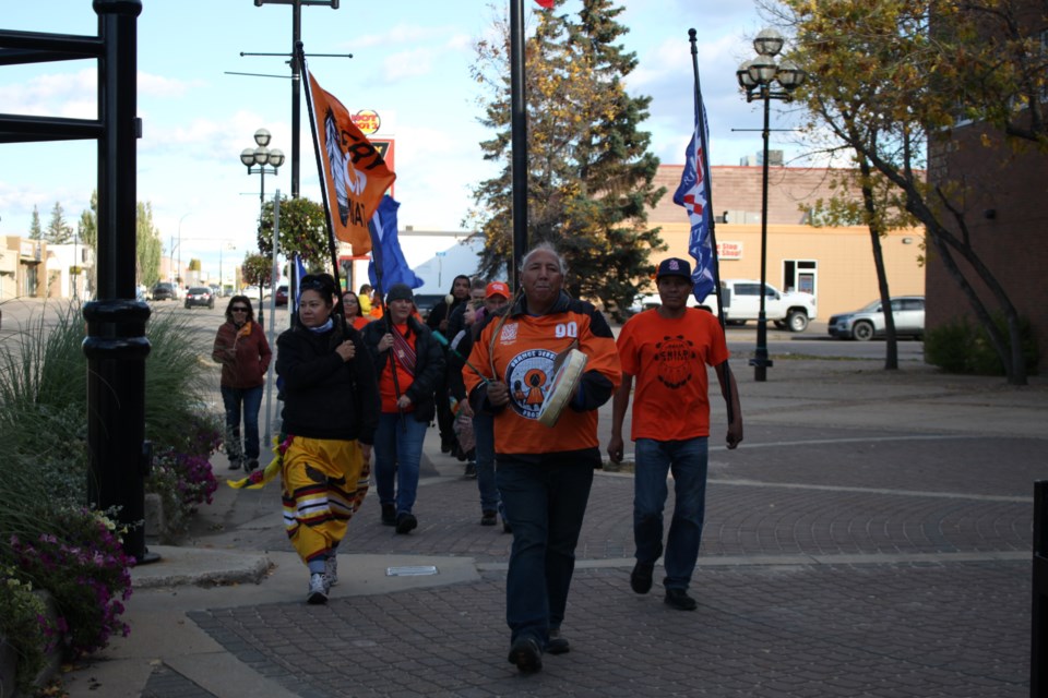 A walk in commemoration of National Day of Truth and Reconciliation headed down Main street in Bonnyville.