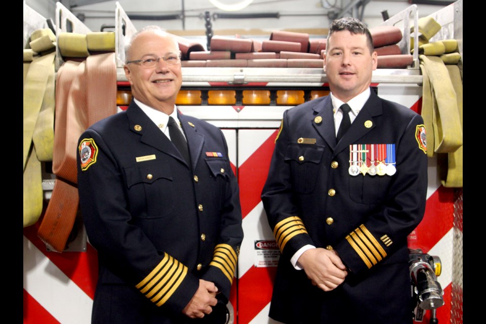 Resigning Regional Fire Chief Jay Melvin (Right) stands next to his predecessor Brian McEvoy. Melvin was appointed to the role of regional fire chief in December of 2018.