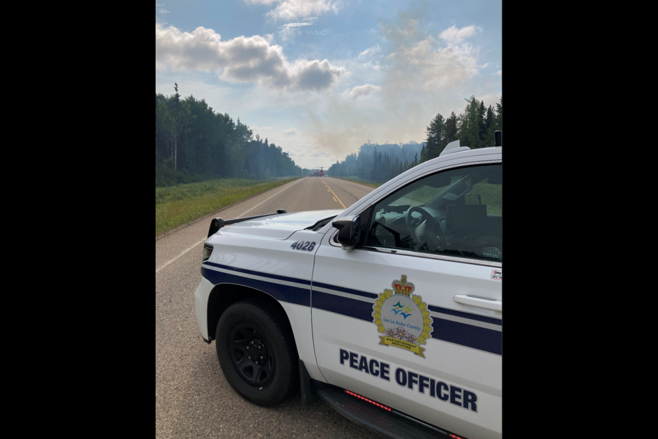 A series of lightning strikes caused wildfires on Aug. 27 in the Lac La Biche Forest Area reducing traffic on Highway 881 north of Lac La Biche to one lane while provincial and local fire crews dealt with the fire.