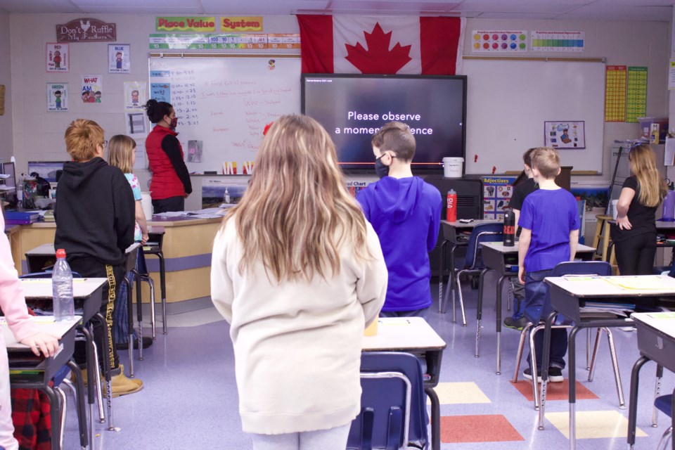 Virtual Remembrance Day at Aurora Middle School. Ms. Mogharbi's Grade 4 class during the moment of silence.