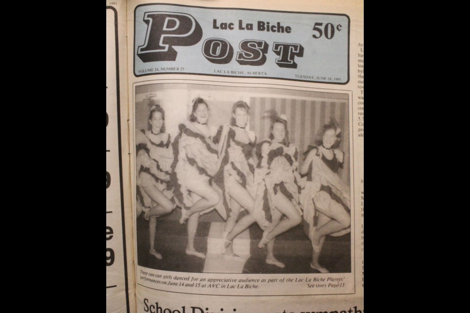 June 1991. Lac La Biche POST front page of a can-can chorus line of local dancers in a Lac La Biche Players' performance on the McGrane Theatre stage. Can-can you identify any of the dancers?
