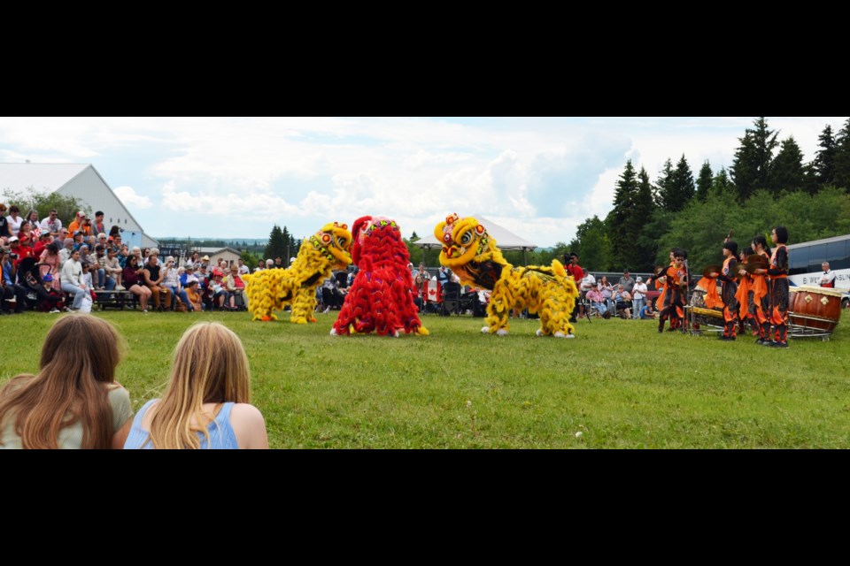 Three dancing lions from the Hong De Cultural and Athletic Association performed an unforgettable and exciting routine following the six-minute Canada Day Drumming event.
