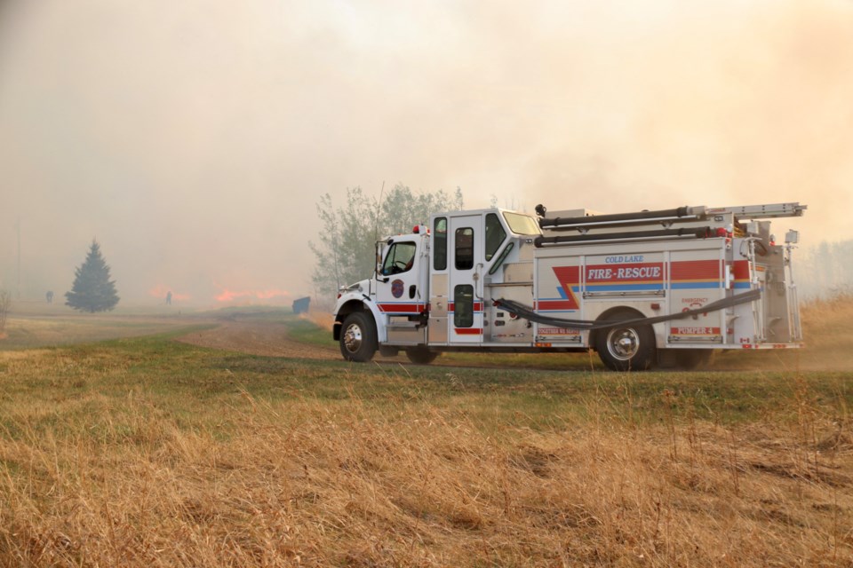 Fire crews are on scene at a large grass fire along Hwy. 28.