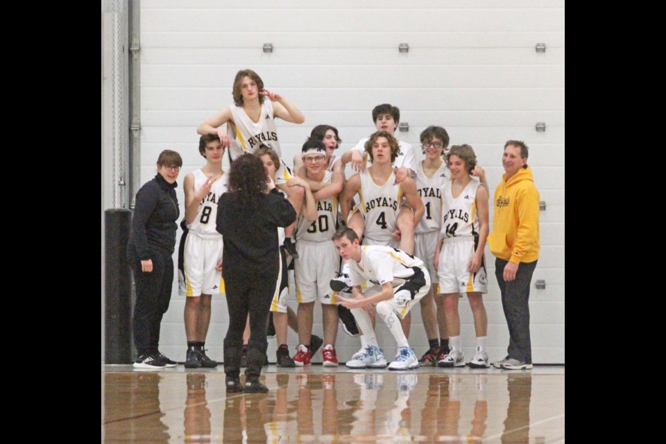 The Cold Lake Royals JV boys team pose for a fun photo after finishing on top of the weekend basketball jamboree