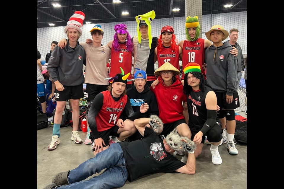 Dale Meyer (in full wolf mode) in front of the Plamondon Wolf Pack team at their recent trip to Nationals in Edmonton.