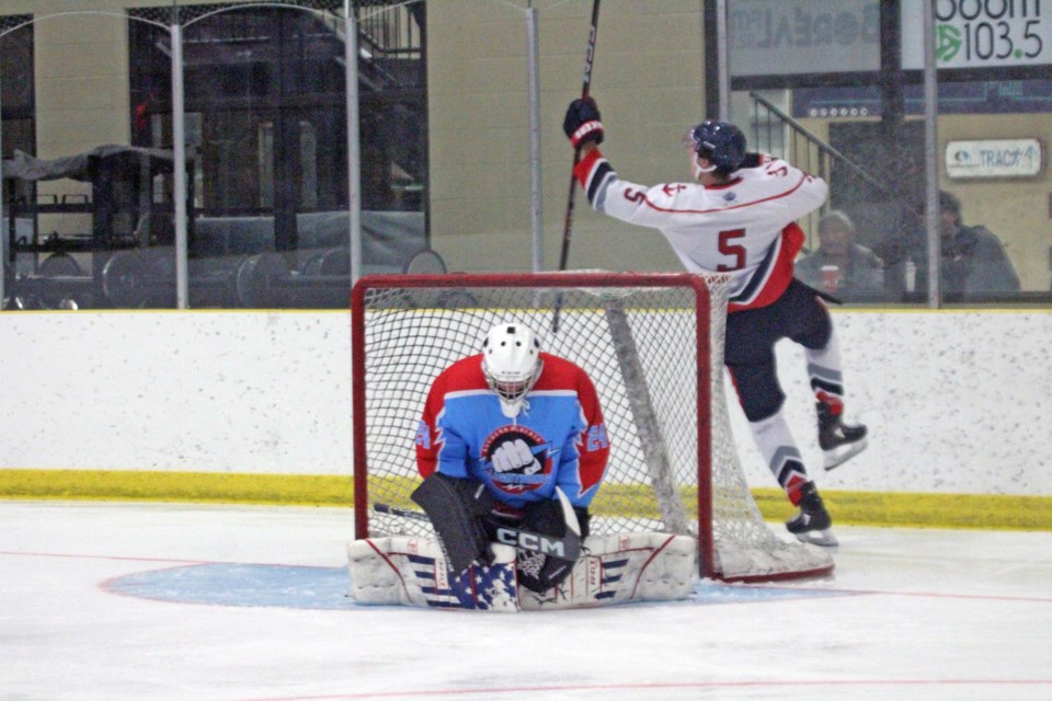 One - Lakers' forward Raiden Perkins celebrates his goal - the first for the Lac La Biche Lakers franchise – as Lightning goalie Brodie Madagan takes a moment to regroup.