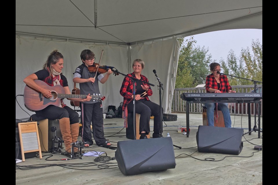 Girlz with Guitarz, Tracy Lord, her sister Karen Levoir and their aunt Michele Gauthier performed all weekend, even offering set with Lord's son Helix accompanying them.       Photo: Crystal Plamondon