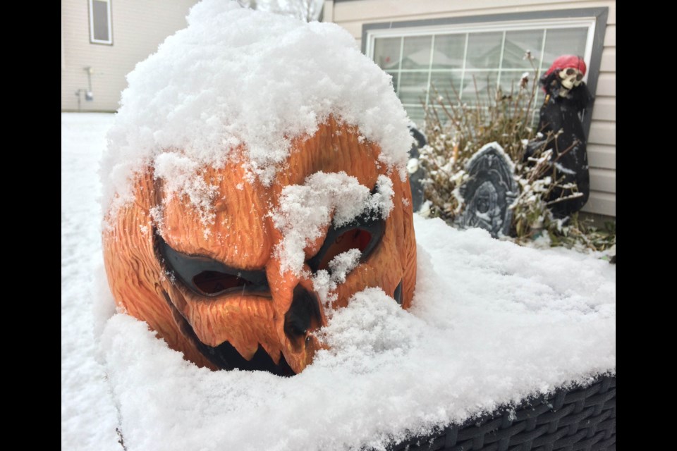 A layer of light snow covers Halloween decorationsat a home in a Lac La Biche area neighbourhood on Thursday.
              Image Rob McKinley