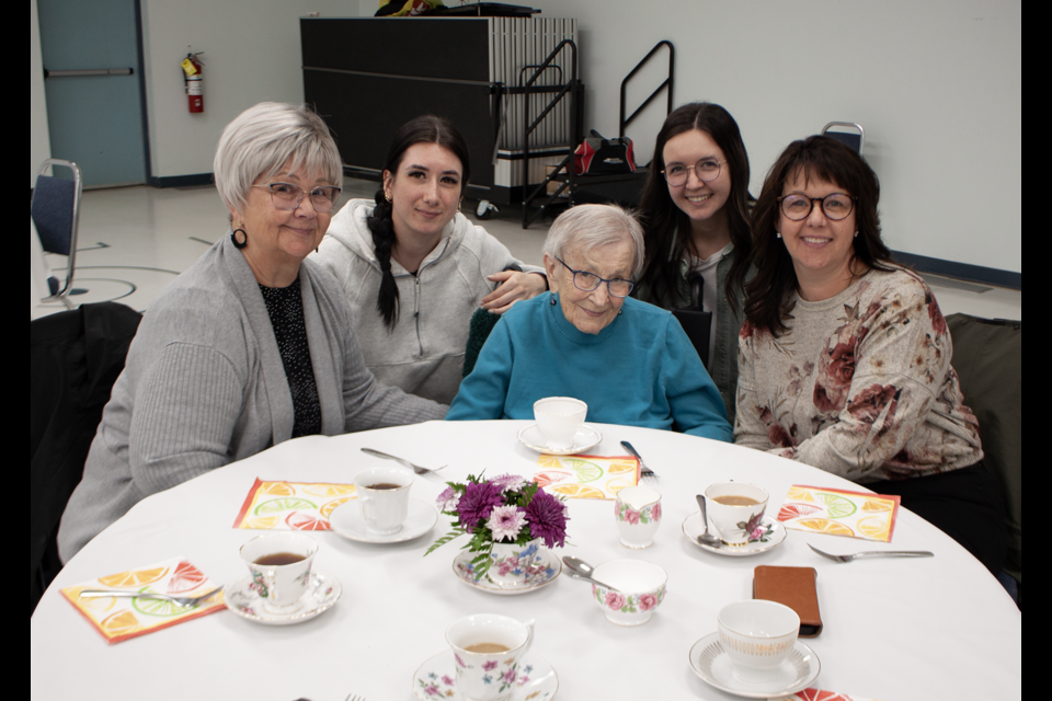 (Left to right) Elda Thackeray, Mackena Foisy, Elsie Smith, Taylor Foisy, and Karla Foisy enjoy the Strawberry Tea event, held on May 8.