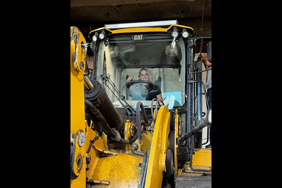 Rene Post in a loader.