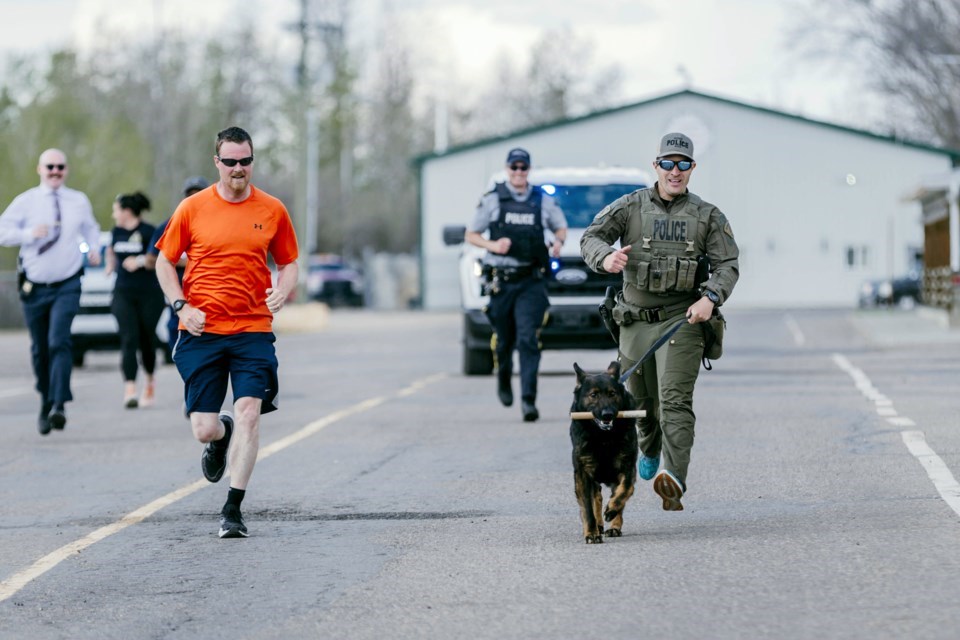 Lotus and Druhan participate in the 2023 RCMP Road Race in St. Paul.