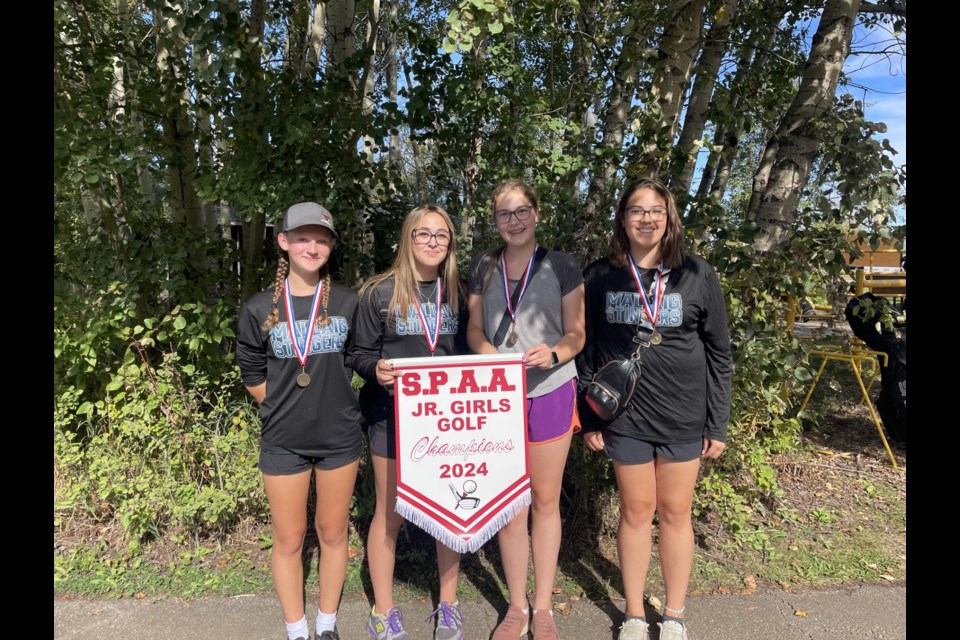 The École Mallaig School junior high girls' golf team includes Allie Kelley, Emery Amyotte, Kenzie Malo, and Ali Malo. The team won this year's junior SPAA banner.