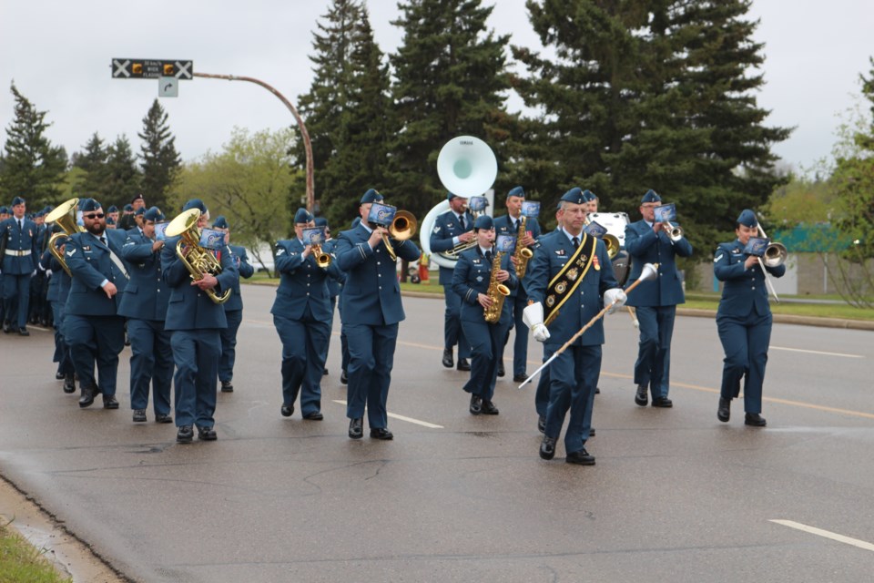 The 4 Wing marching band leading the Freedom of the City parade in the City of Cold Lake.