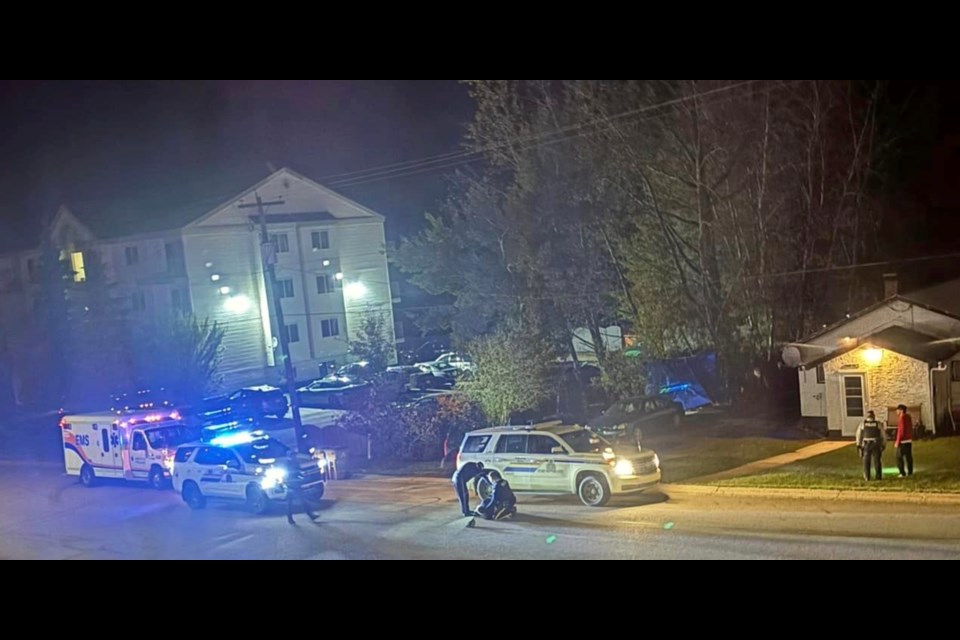 RCMP and ambulance at the scene of an arrest following complaints of a disturbance on a Lac La Biche street on the morning of October 1.