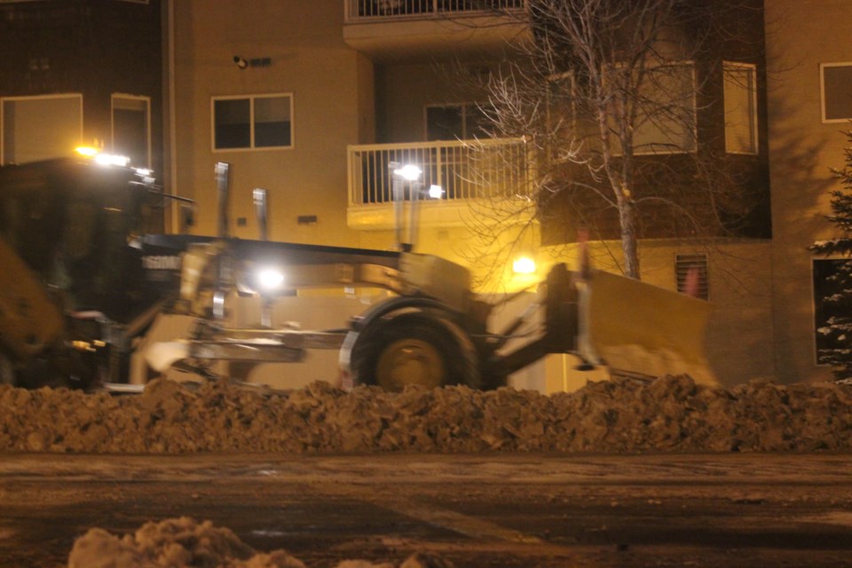 Snow clearning Lac La Biche night.