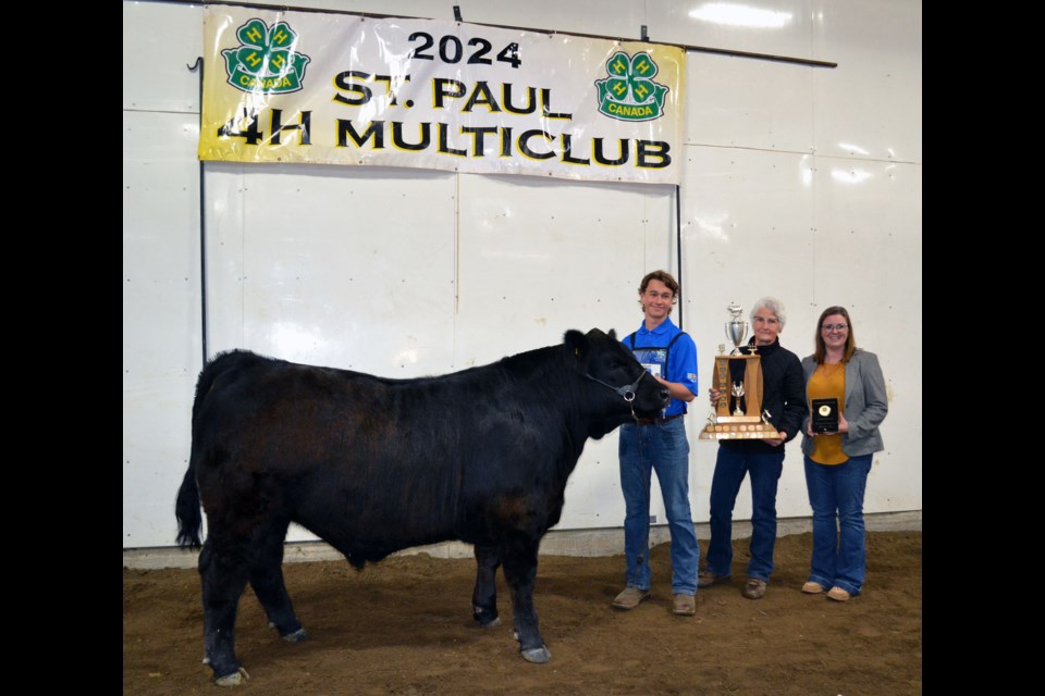 Kale Lavoie’s steer Glen, who he said stayed active during the winter months, gaining weight while building body mass, earned him the Grand Champion trophy presented by longtime St. Paul 4-H advocate Edith Fontaine and keeper trophy presented by judge Jenine Ruzika.