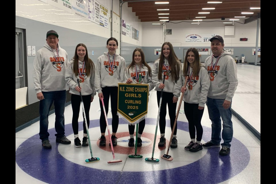 The St. Paul Regional High School girls' team won this year's NEASAA banner. Pictured is Troy Bohn, Kalli Foisy, Cherie Labrie, Ava Corriveau, Oakland Labrie and AJ Jean.